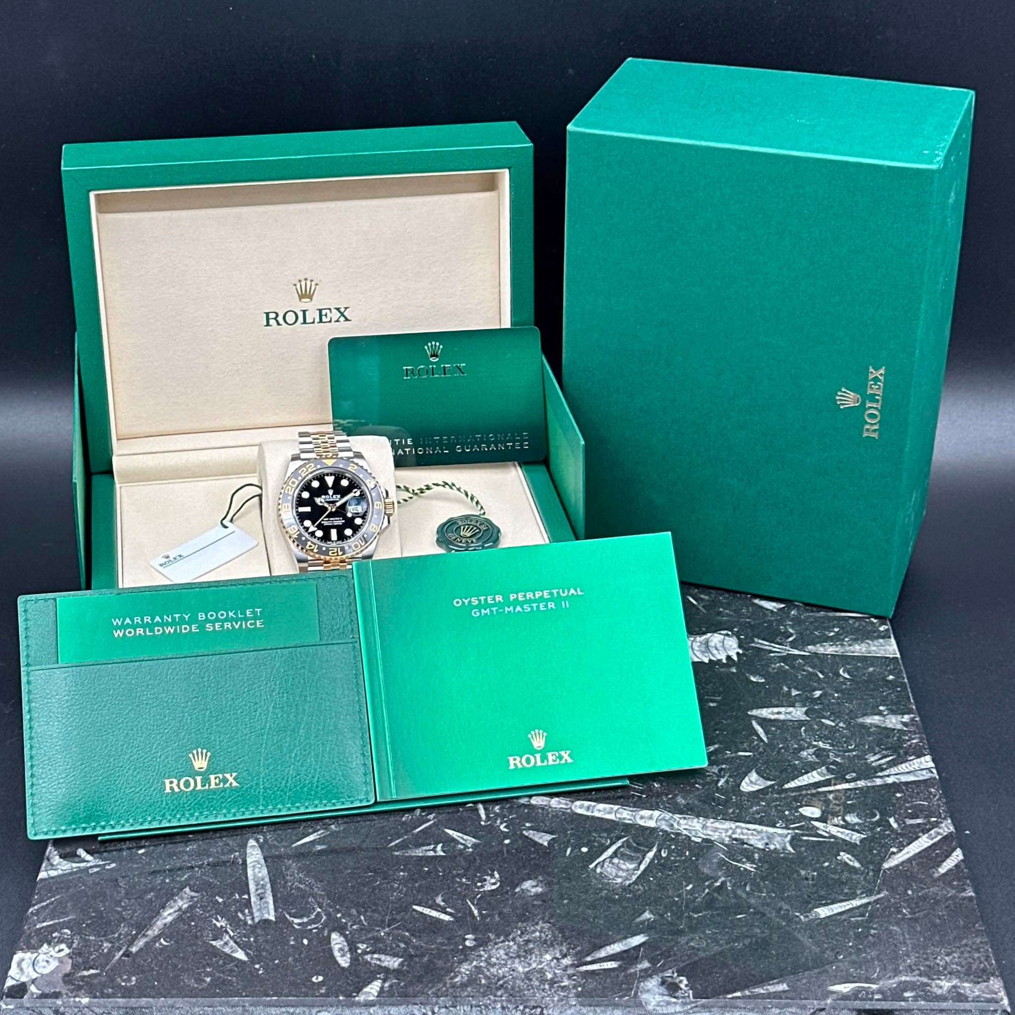 May be an image of wrist watch, cufflinks and text