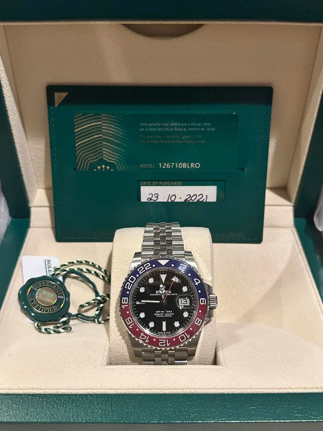 May be an image of wrist watch and text that says '126710BLRO ROLE 財 ET NERIE n 於量 नयय CHT-H S 6 TM • 8 十原商 12 ل 10'