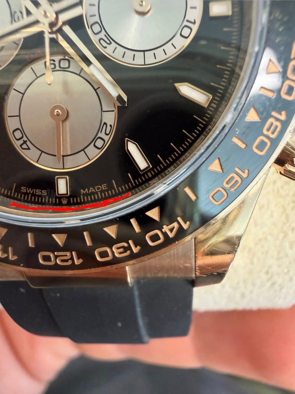 May be an image of wrist watch and text