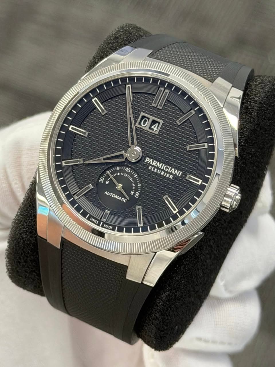May be an image of wrist watch and text