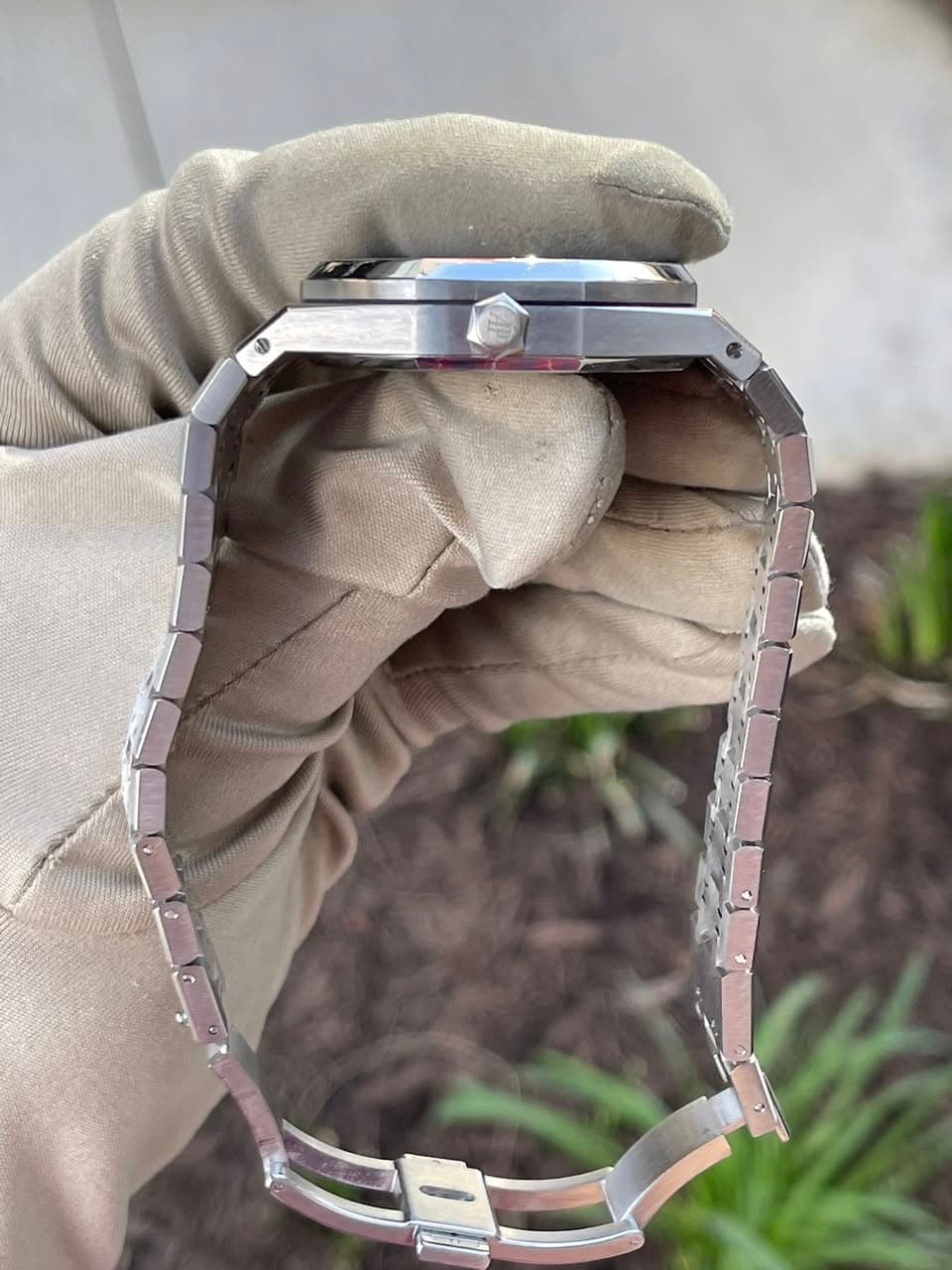 May be an image of wrist watch and jewelry