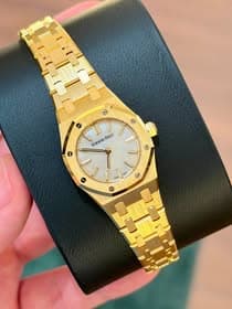 May be an image of wrist watch and text that says '10 PIGUET AUDEMARS'