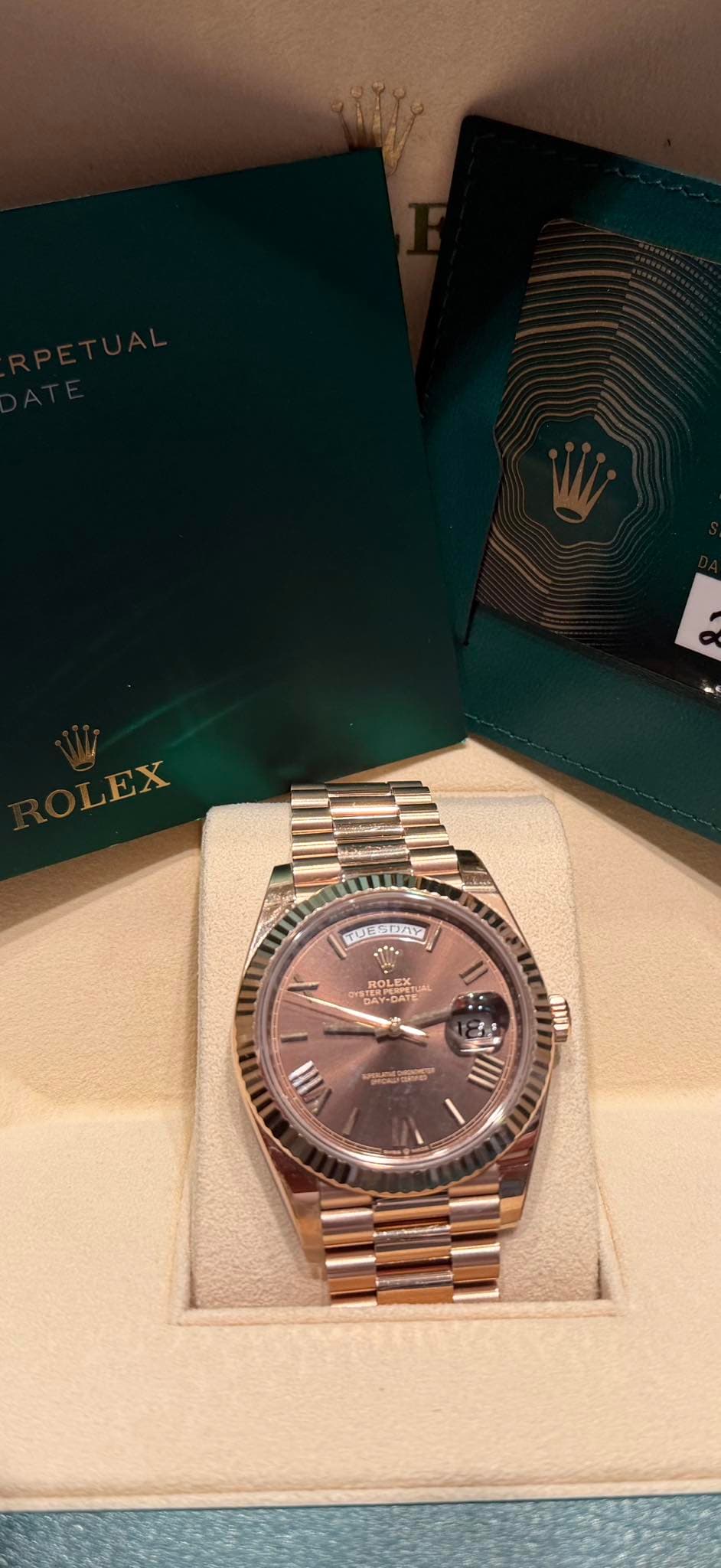May be an image of wrist watch and text