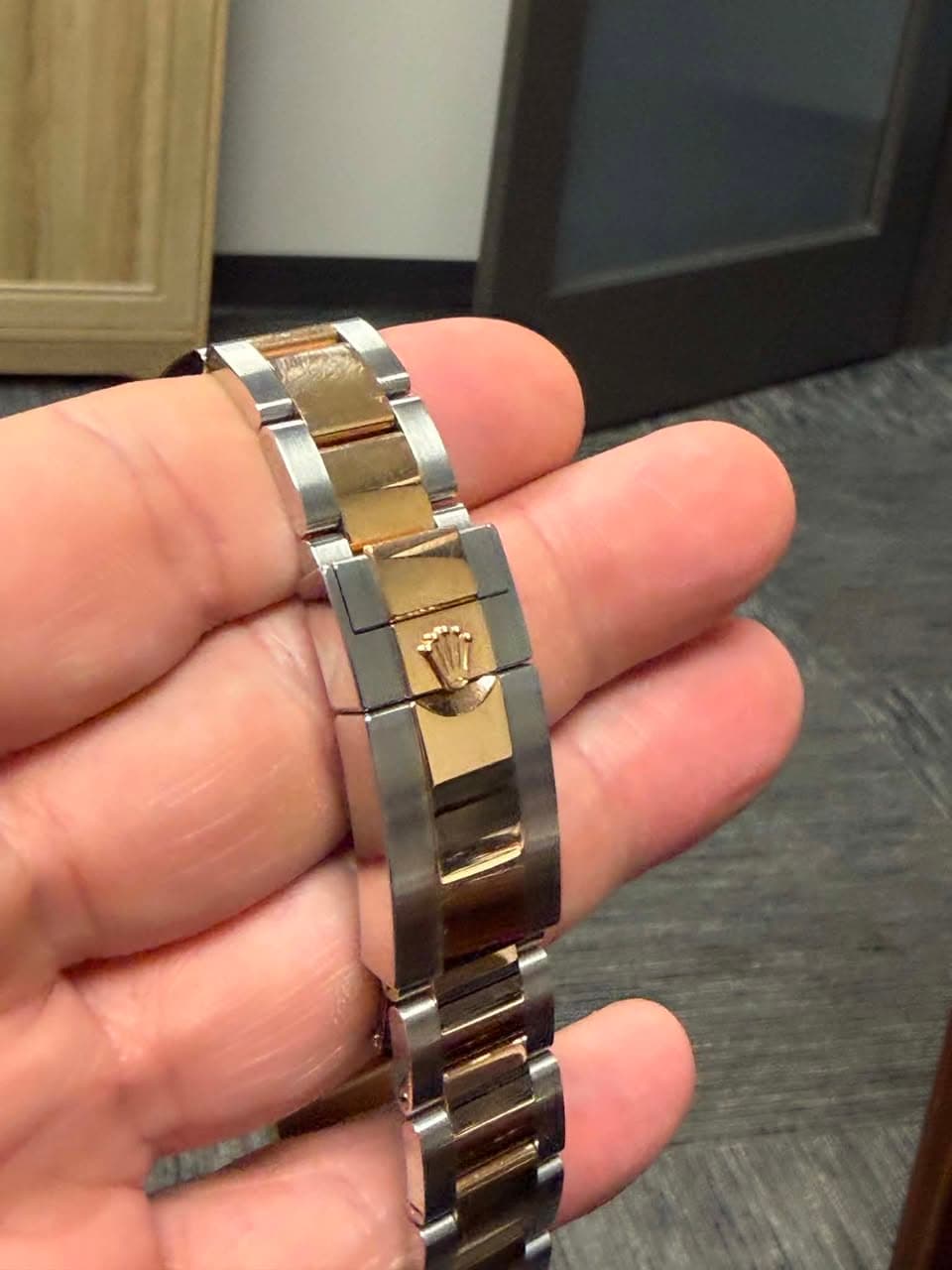 May be an image of wrist watch