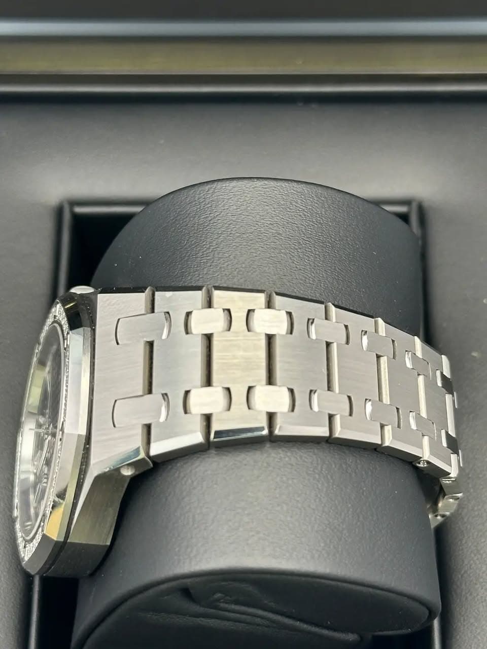 May be an image of wrist watch and text