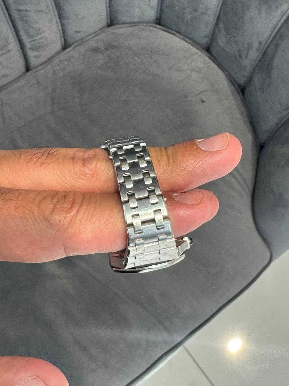 May be an image of wrist watch