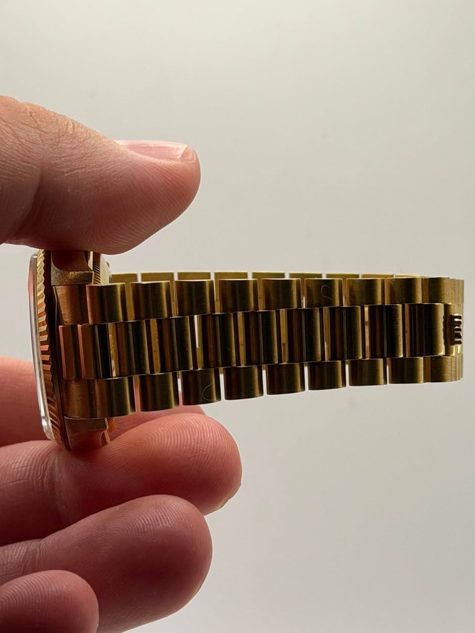 May be an image of wrist watch
