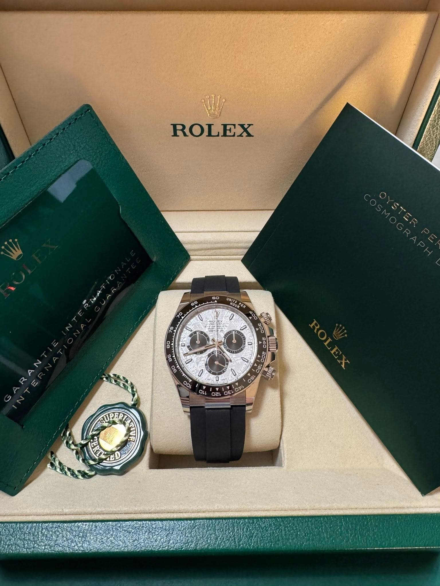 May be an image of wrist watch and text
