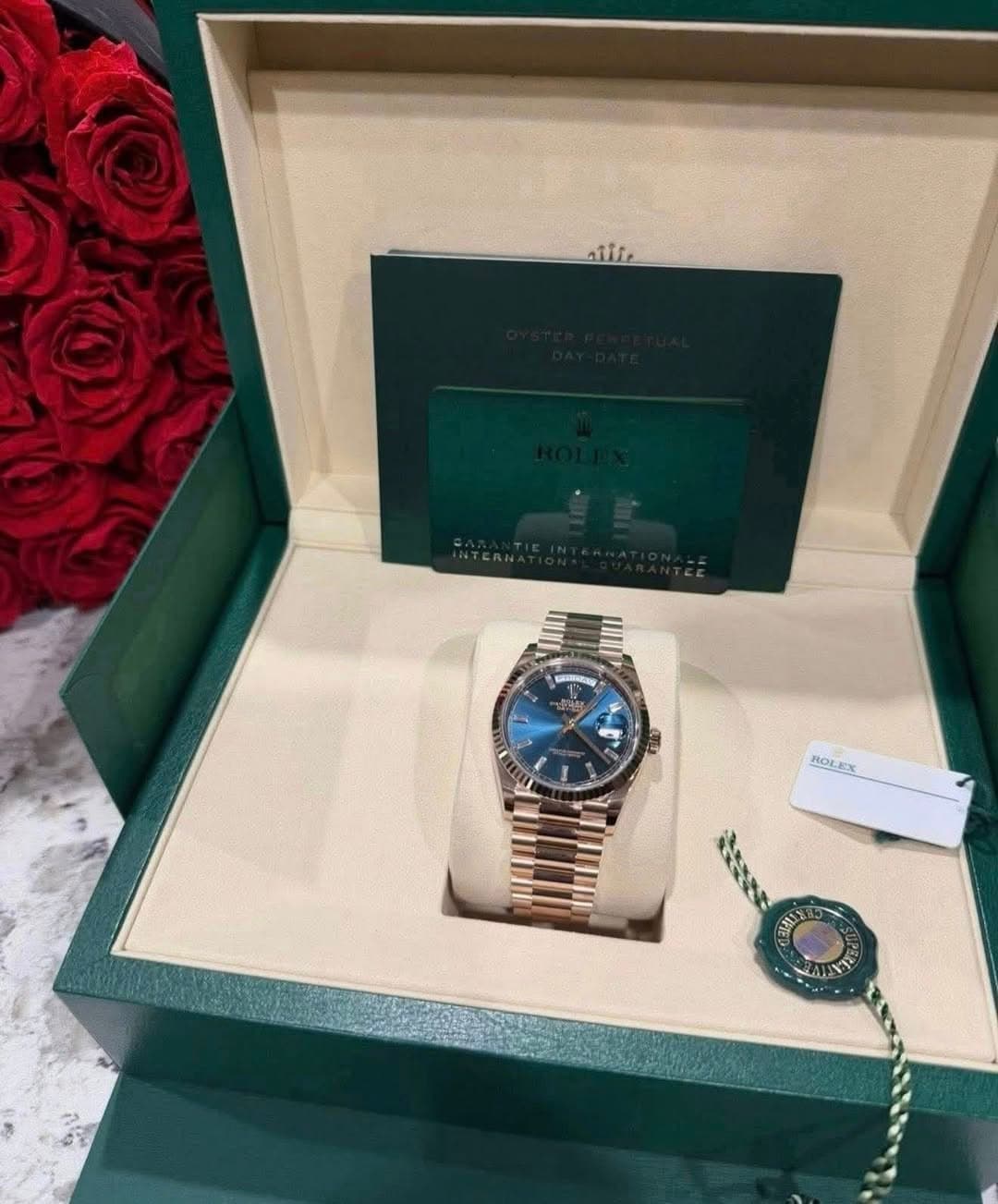 May be an image of wrist watch and text