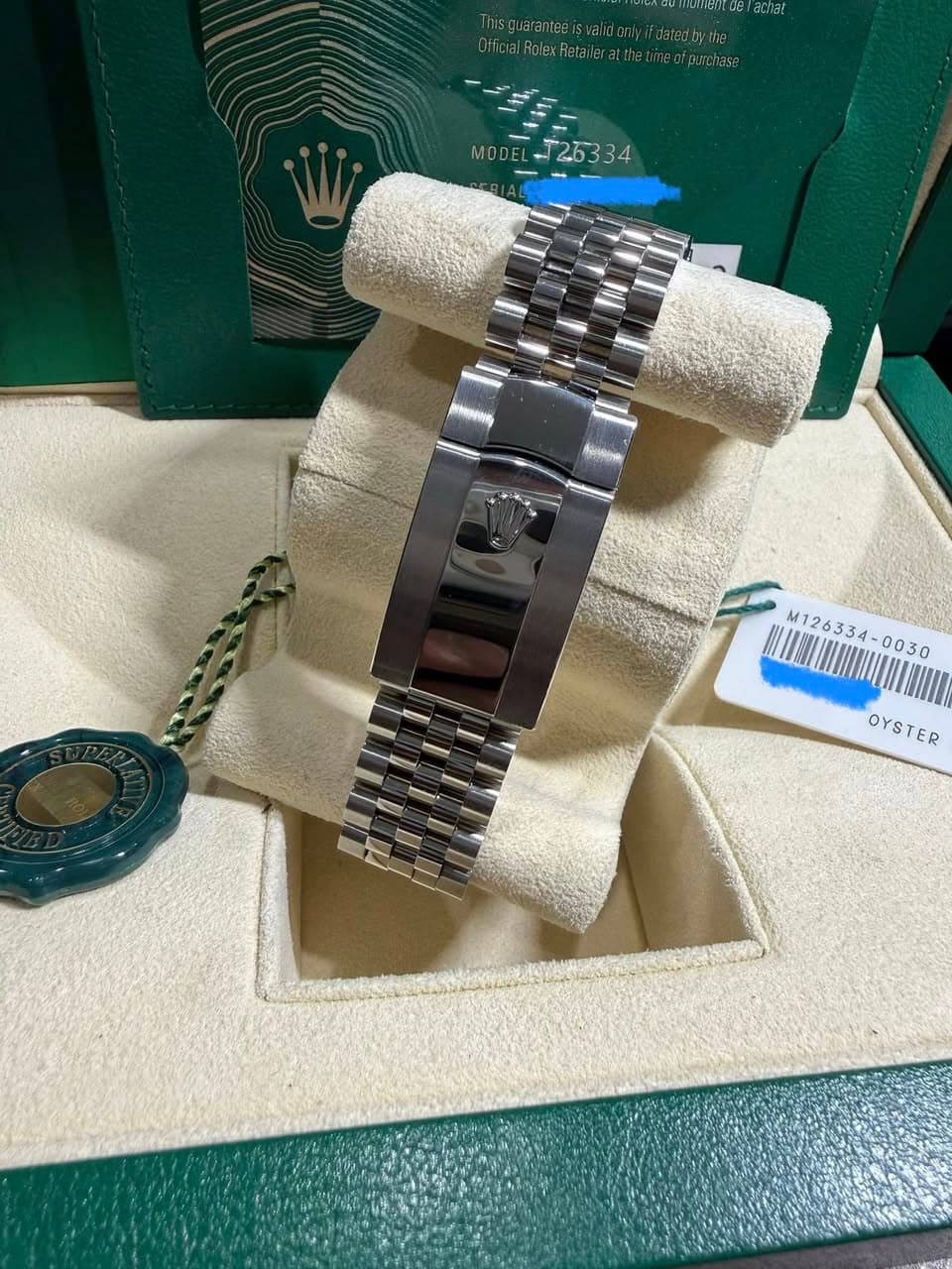 May be an image of wrist watch and text that says 'MODEL- MODEL-T25334 T25334 34 M126334-0030 M126334- M12633 OYSTER OYSTER'