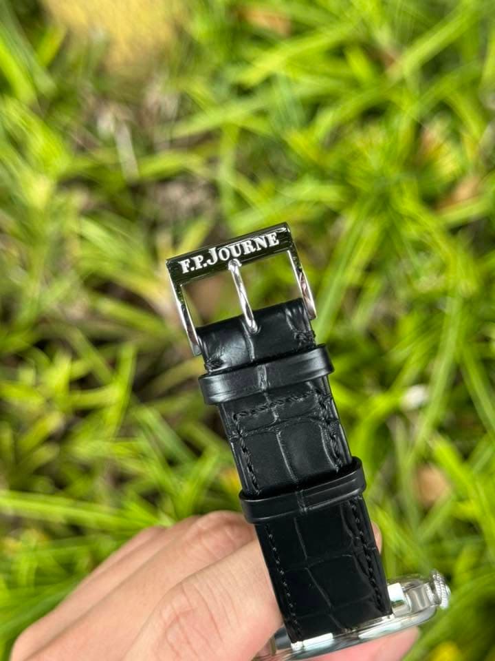 May be an image of digital watch and text that says 'E.PJOURNE F.P.JOURNE'