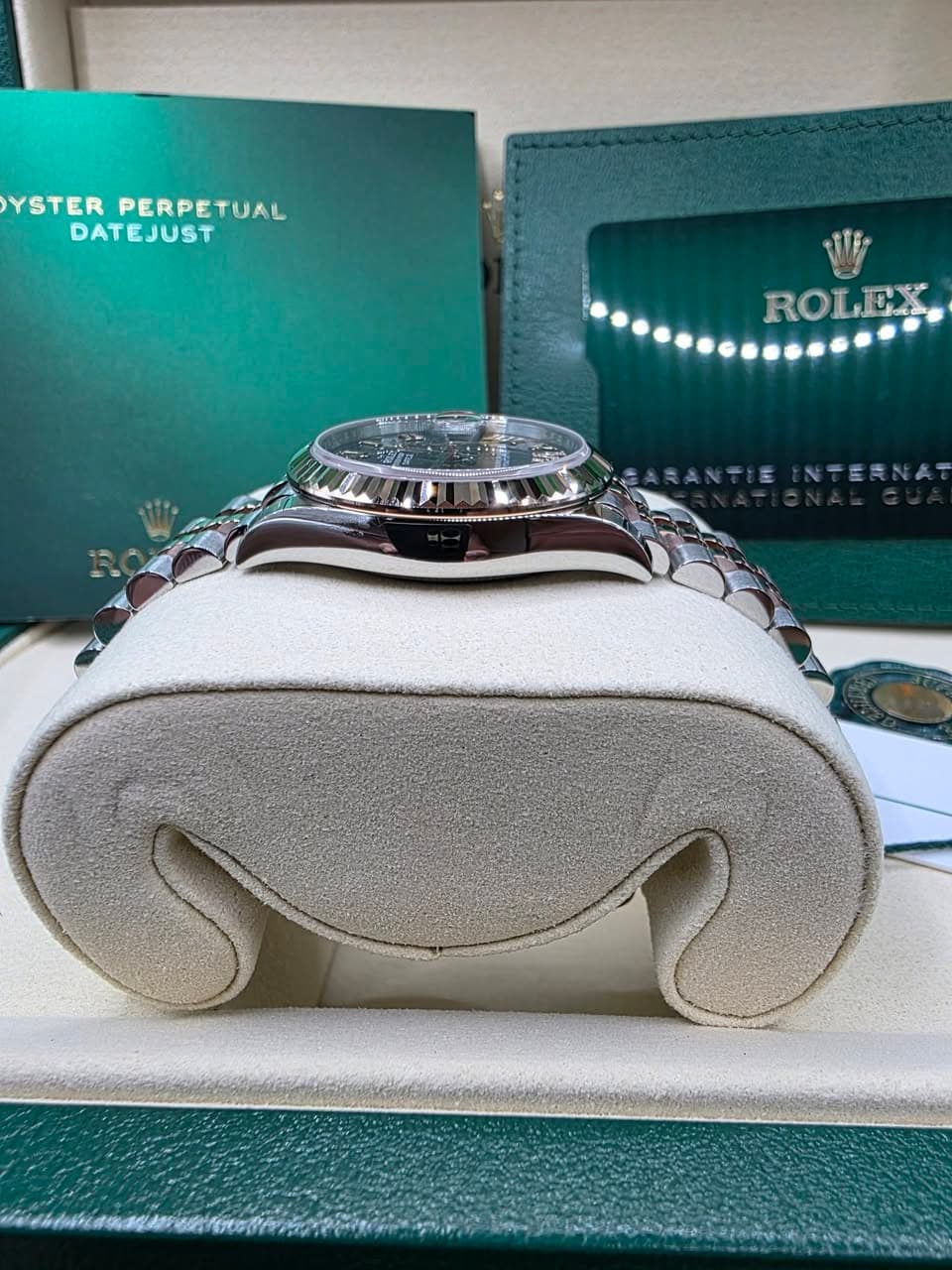 May be an image of wrist watch and text