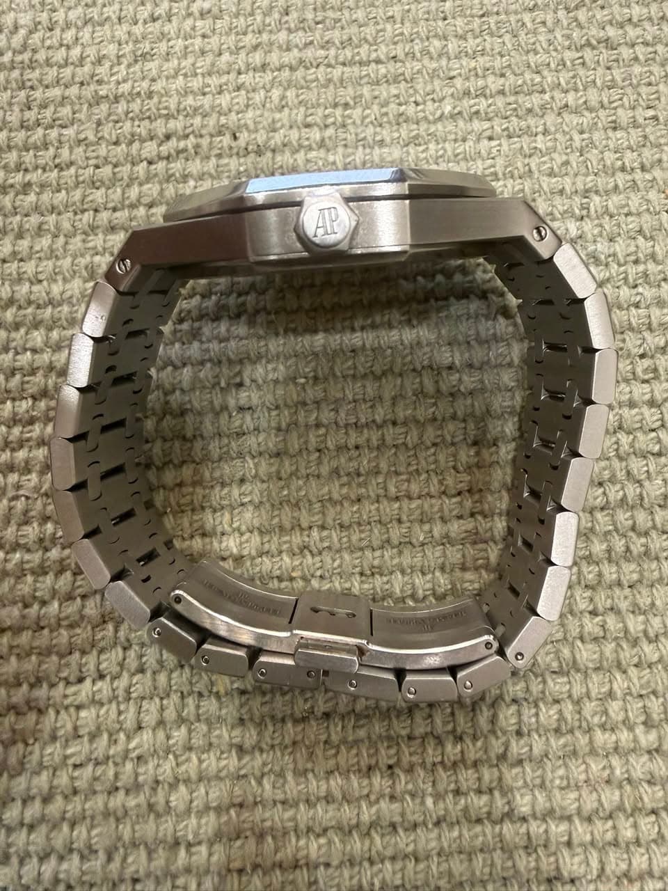 May be an image of digital watch and text that says 'AP'