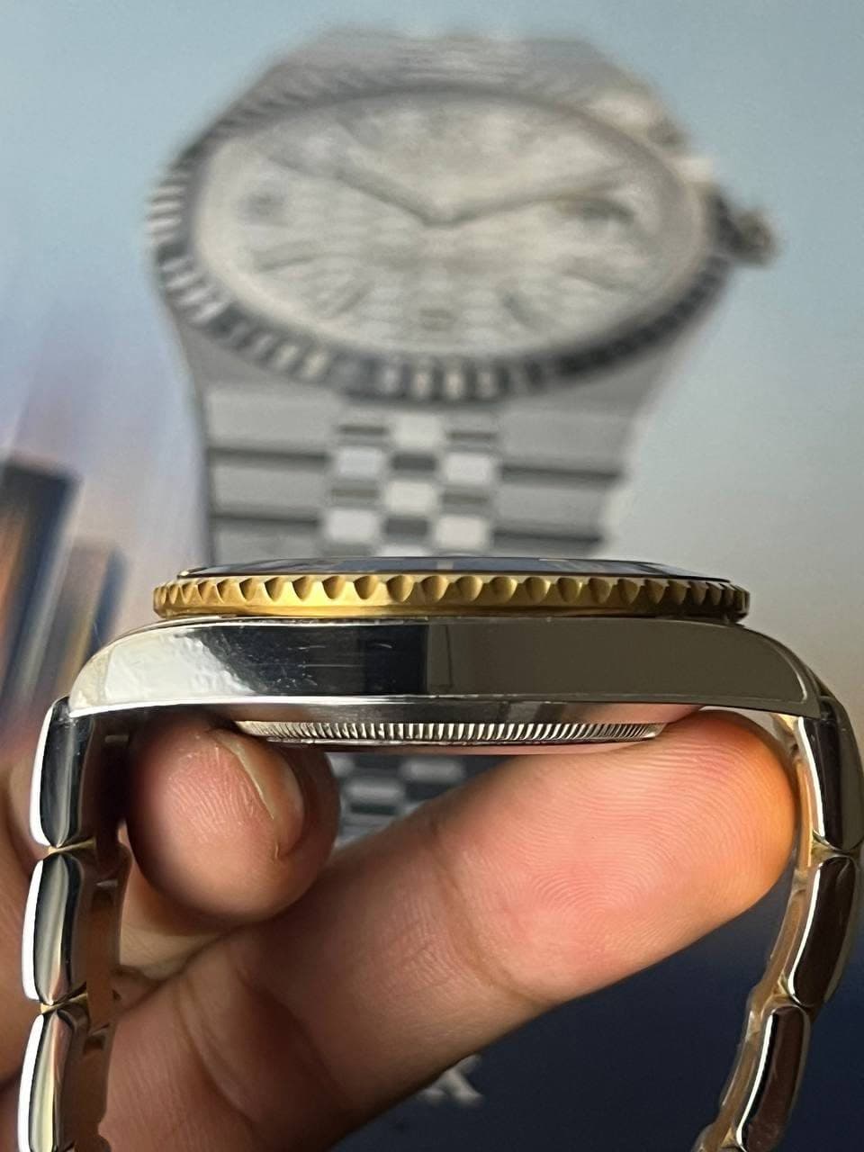 May be an image of wrist watch