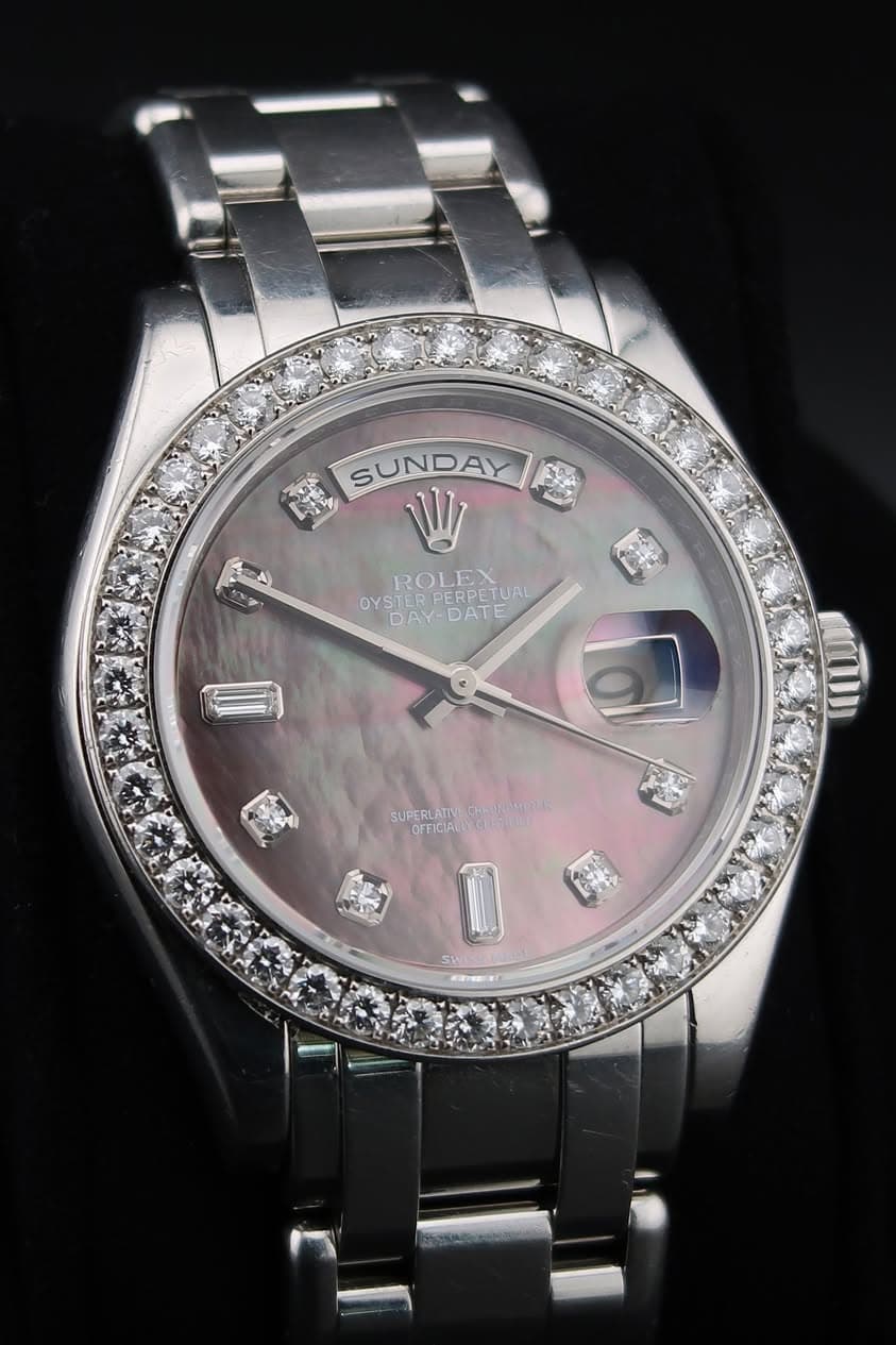May be an image of wrist watch and text
