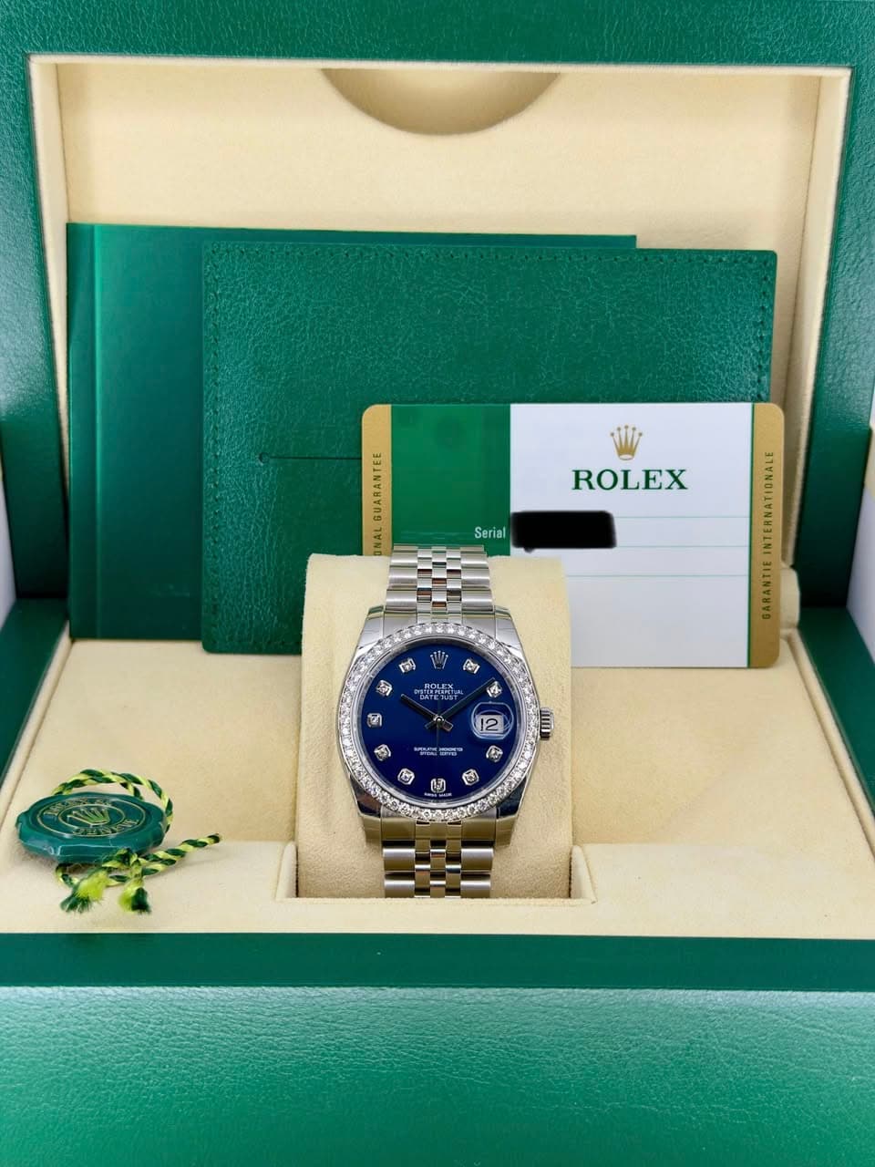 May be an image of wrist watch and text that says '2 NAL ROLEX Ser al Wir Ti ពោទ シ לליי 14 जी 12 ب WOA E ြေ ® 1C'