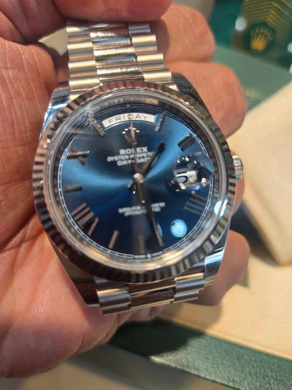 May be an image of wrist watch and text