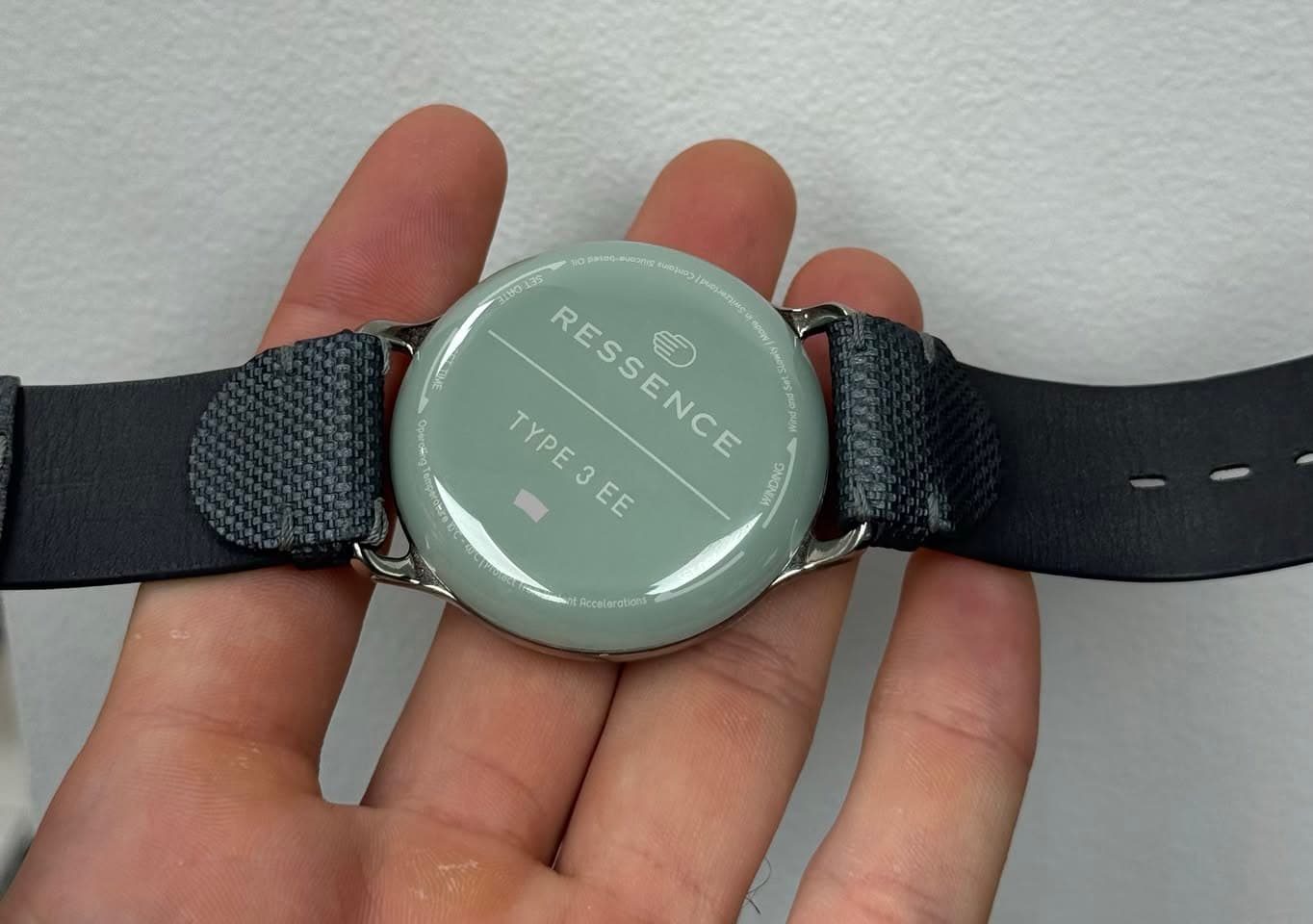 May be an image of digital watch and text
