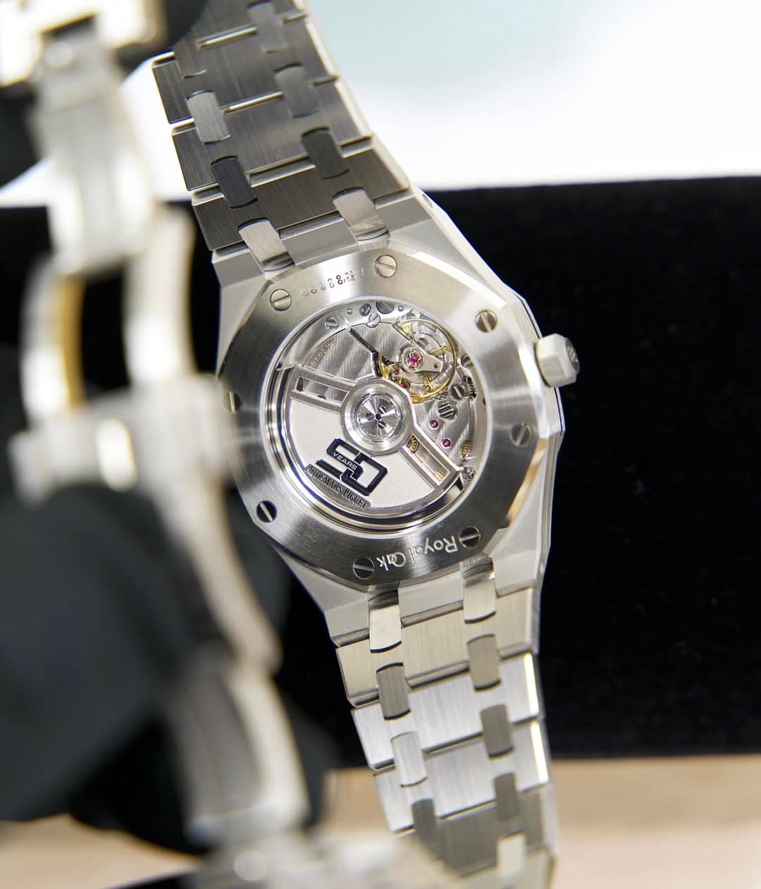 May be an image of wrist watch and text