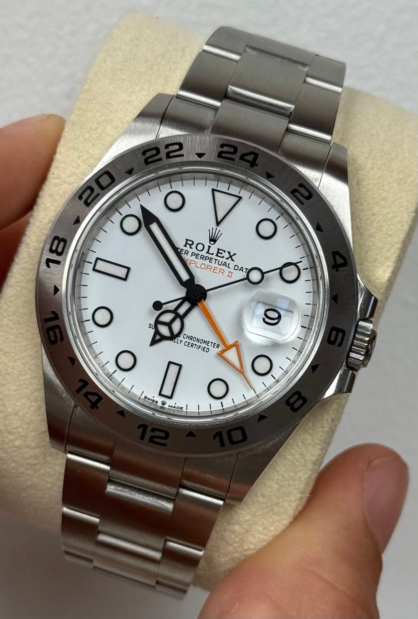 May be an image of wrist watch and text