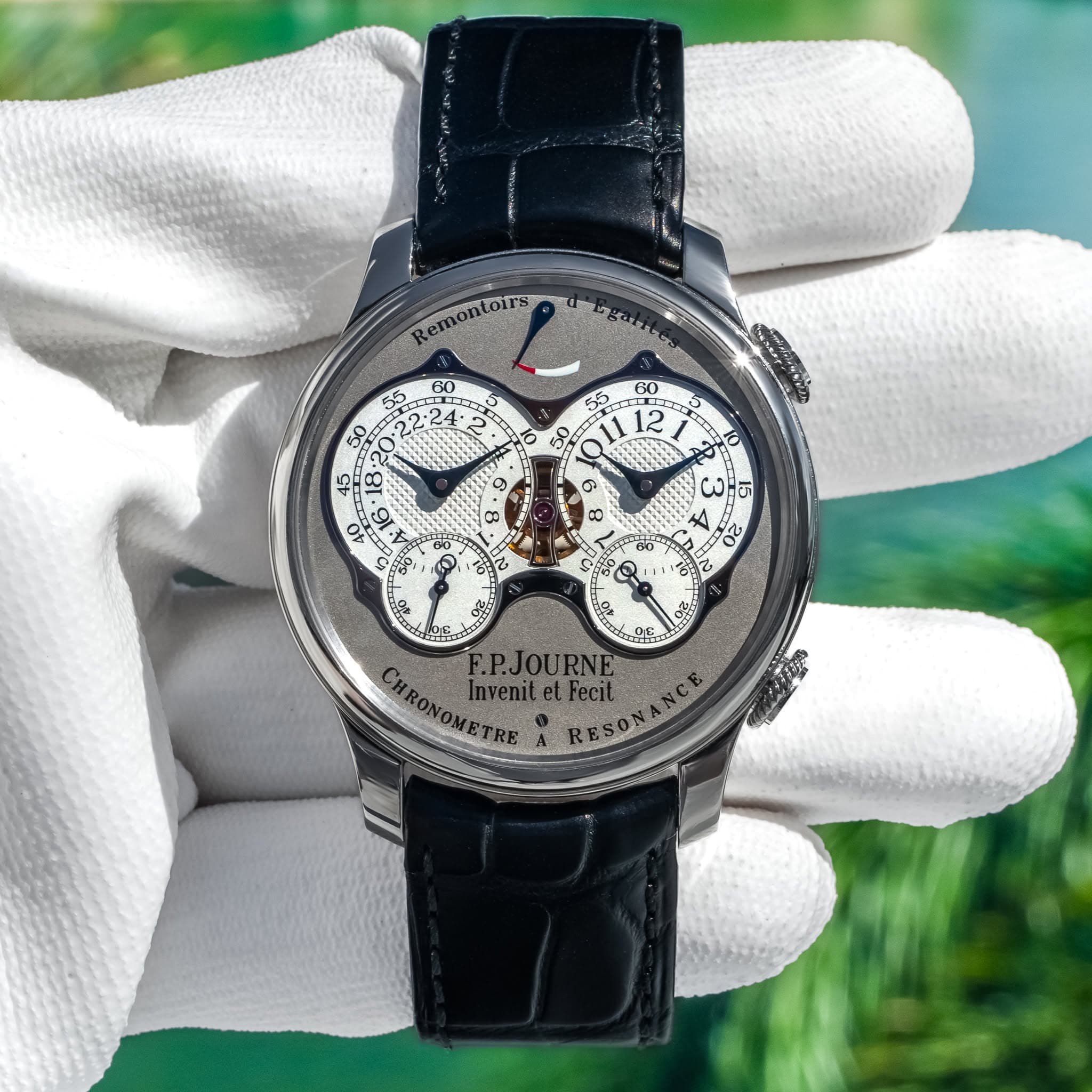 May be an image of wrist watch and text
