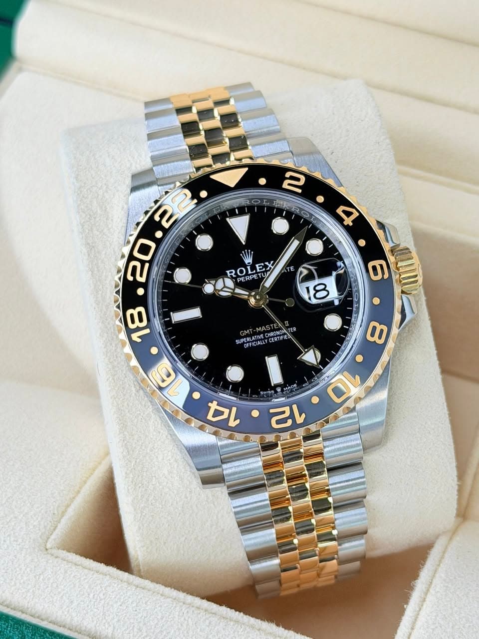 May be an image of wrist watch and text