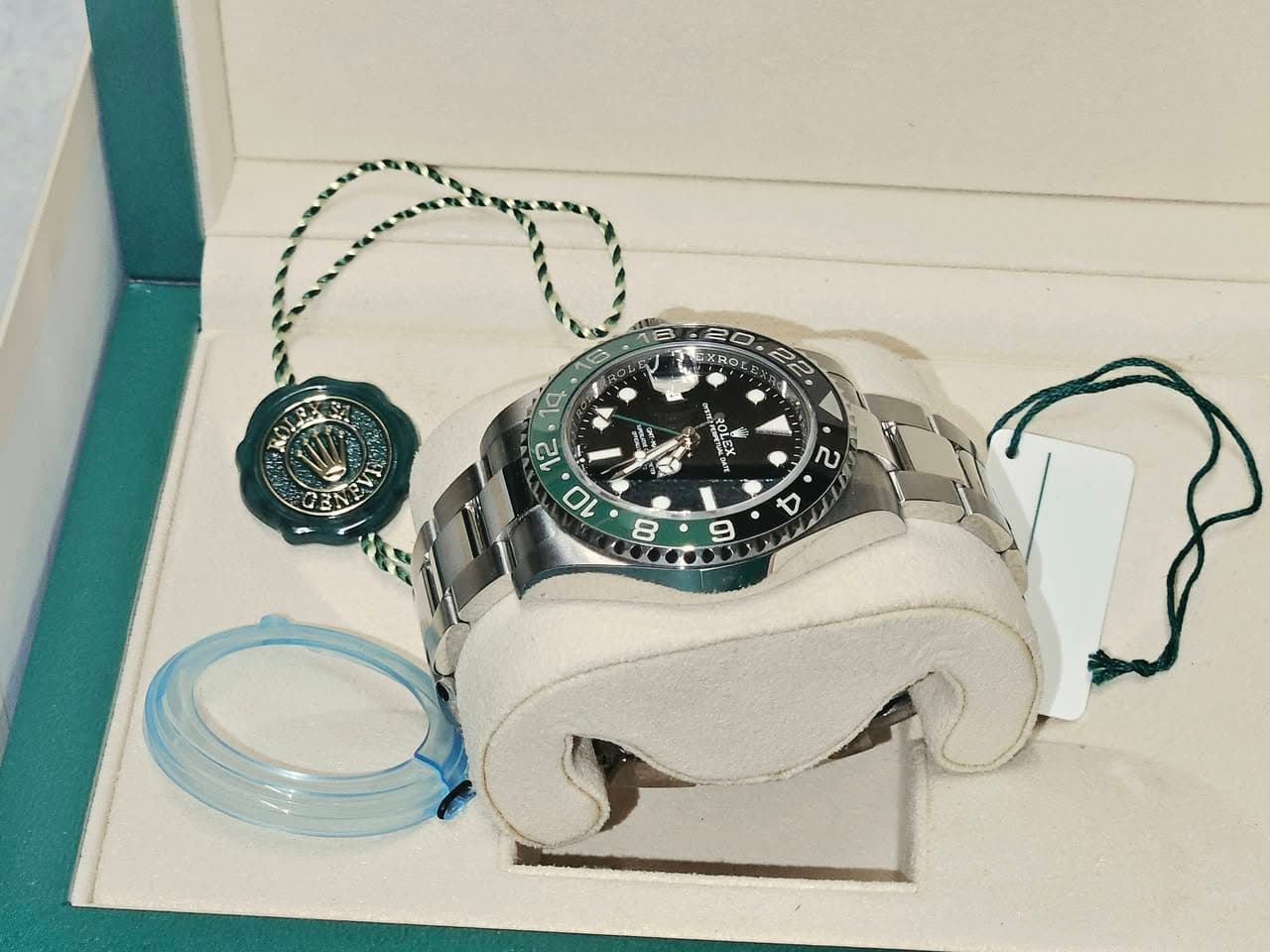 May be an image of wrist watch and text