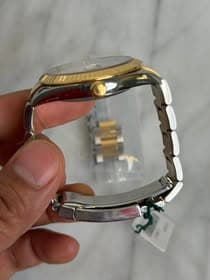 May be an image of wrist watch