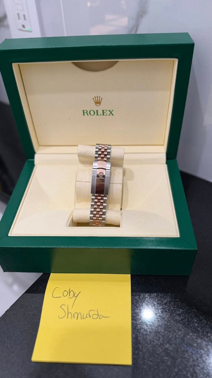 May be an image of wrist watch and text that says 'ROLEX Coby Shmurda'