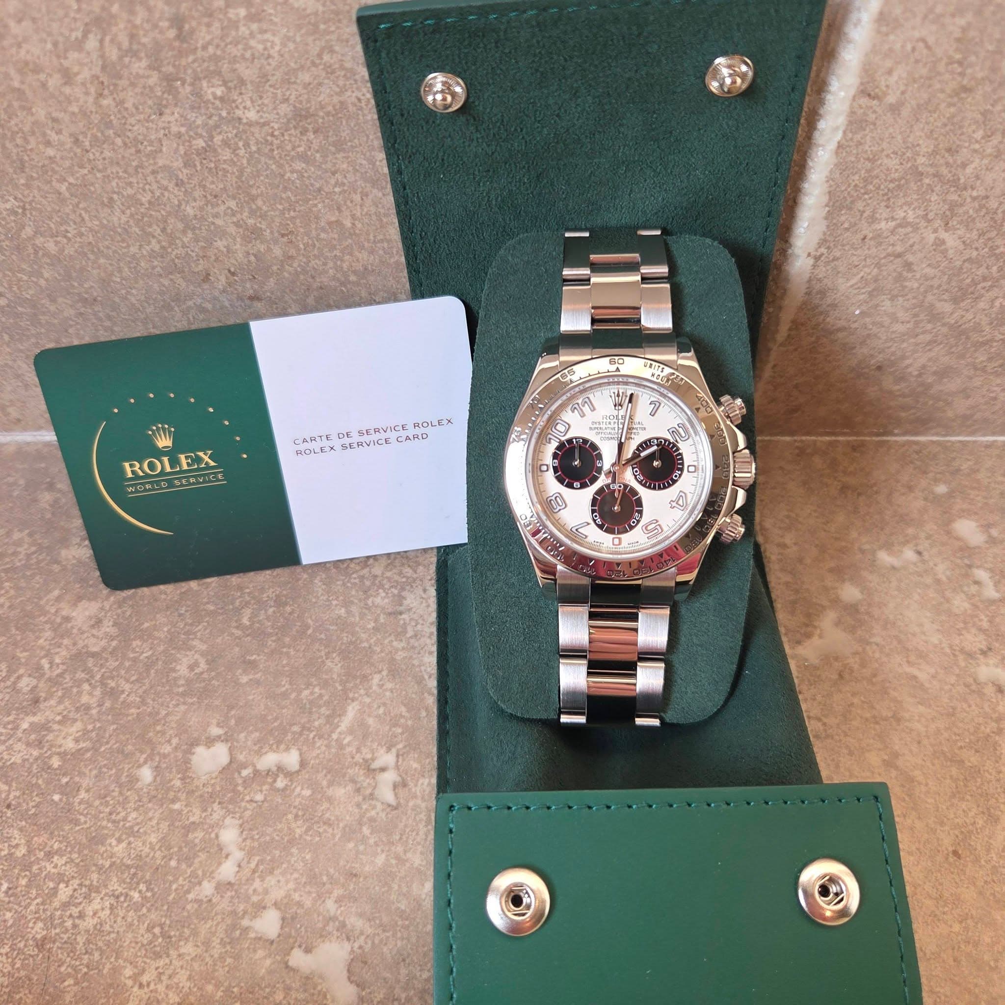 May be an image of wrist watch and text