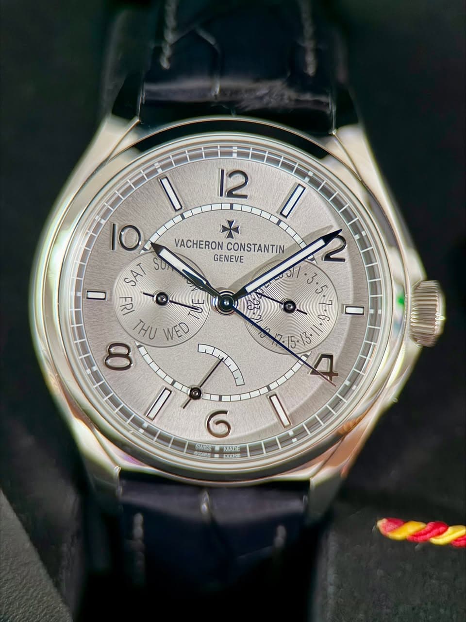 May be an image of wrist watch and text