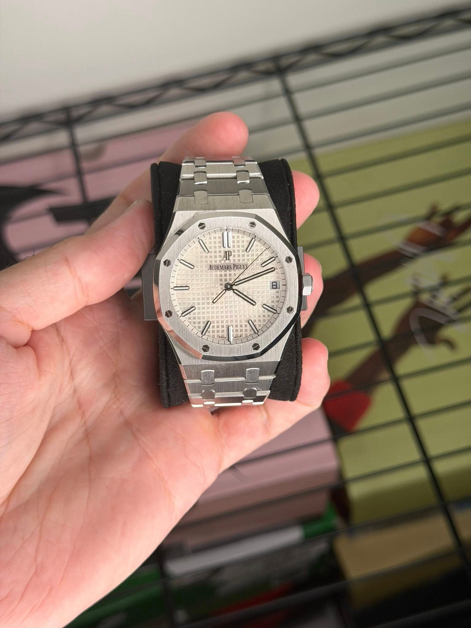 May be an image of wrist watch and text