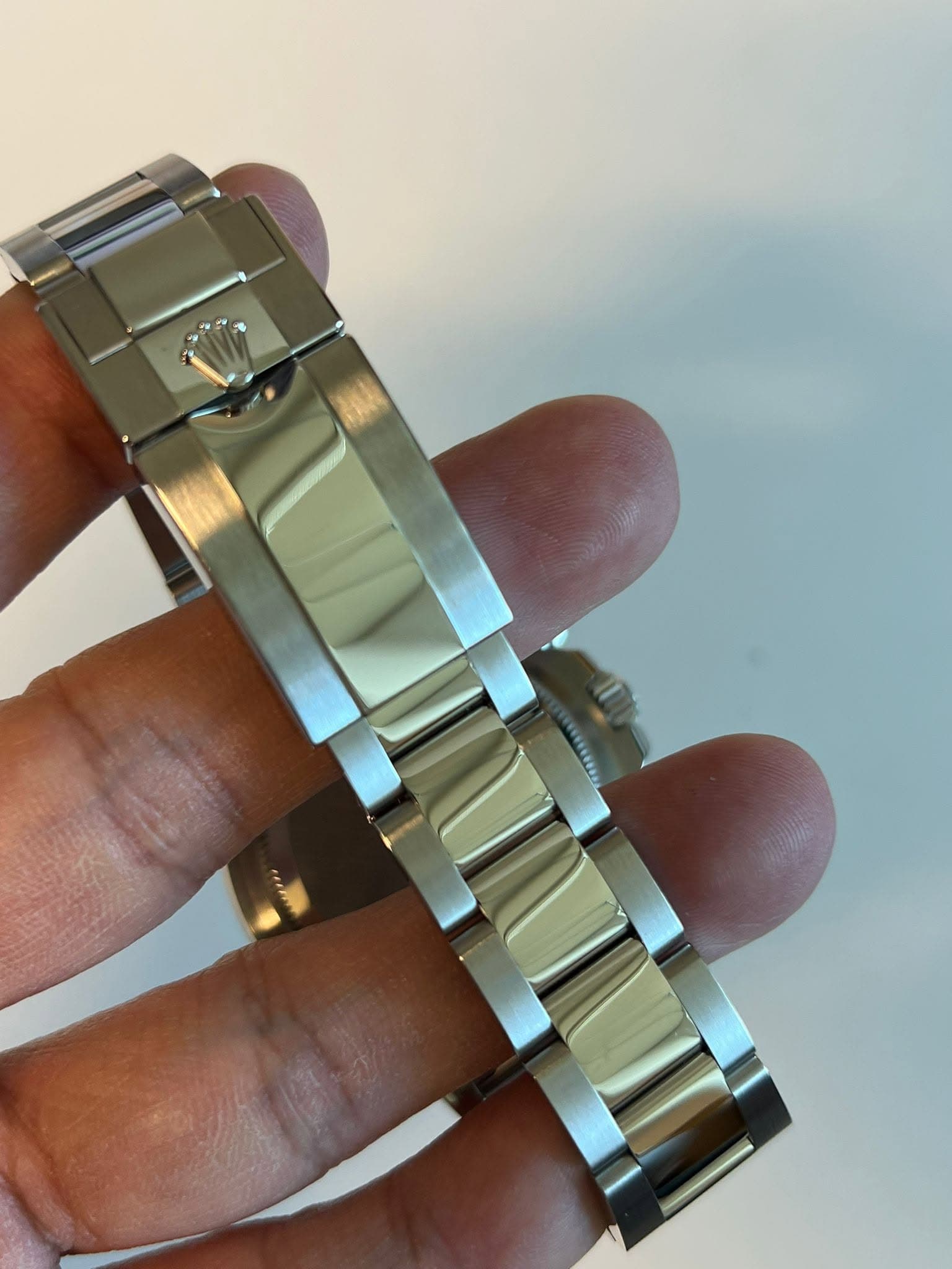 May be an image of wrist watch