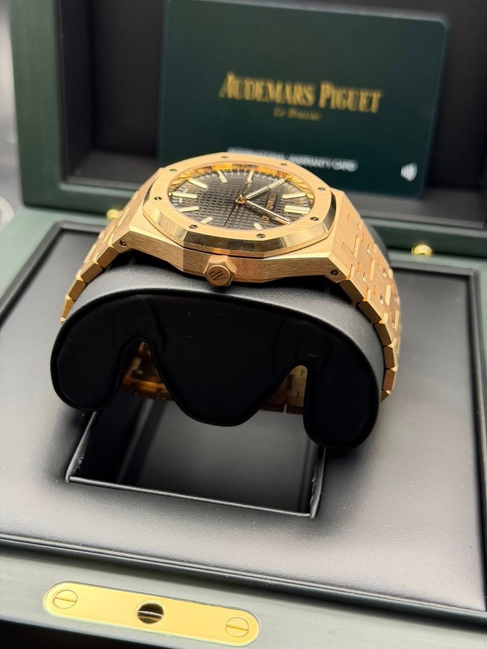 May be an image of wrist watch and text