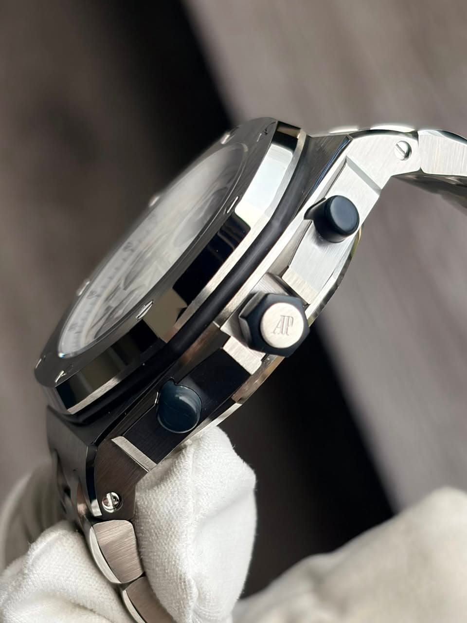 May be an image of wrist watch and text that says 'AT A'