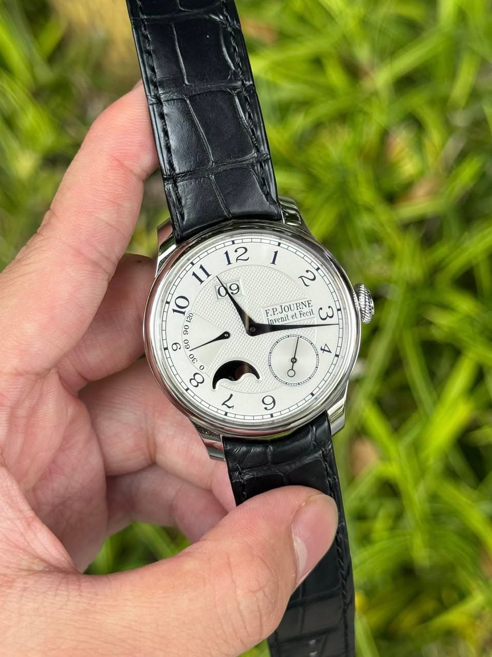 May be an image of wrist watch and text that says '1 ၃ F.PJOURNE F.P.JOU EPJOURNE RNE Invenit Fecit سى o L 9 ODO د o'