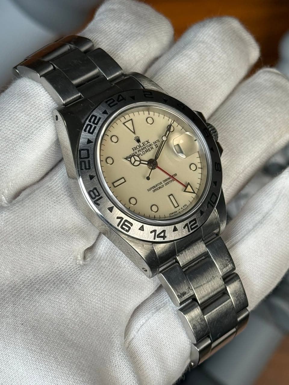 May be an image of wrist watch and text