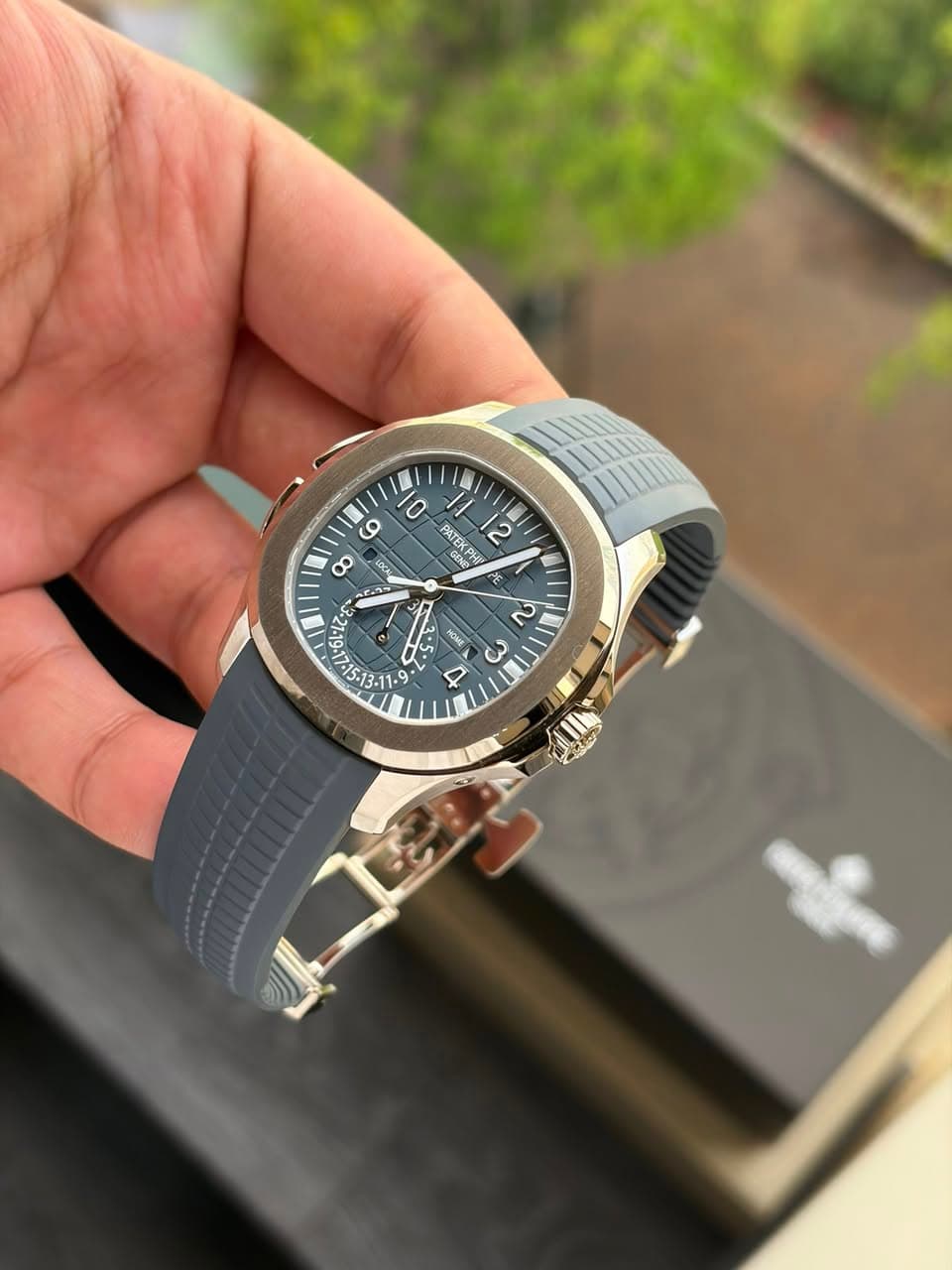May be an image of wrist watch and text