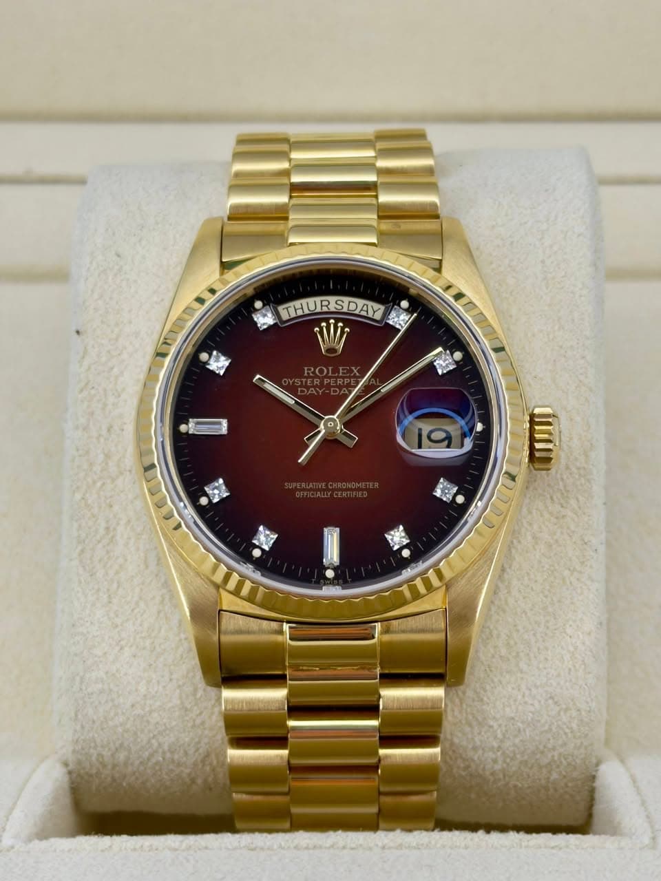 May be an image of wrist watch and text