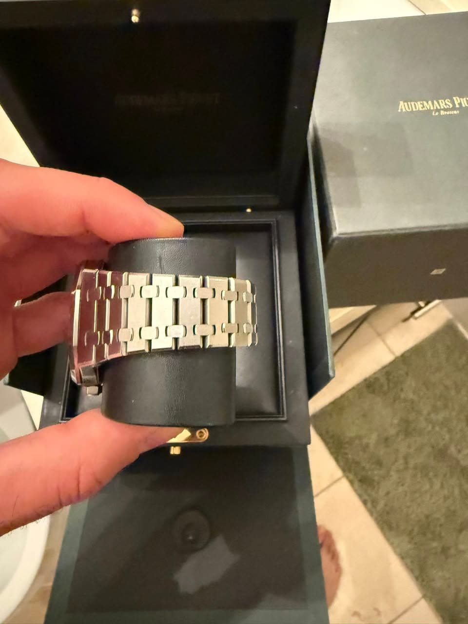 May be an image of wrist watch and text