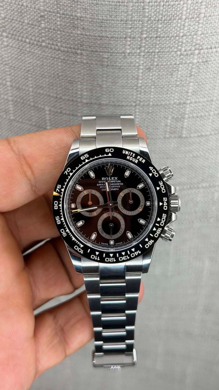May be an image of wrist watch and text