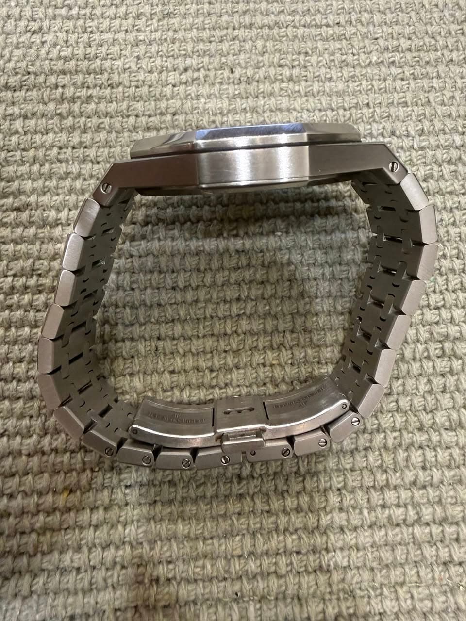 May be an image of wrist watch