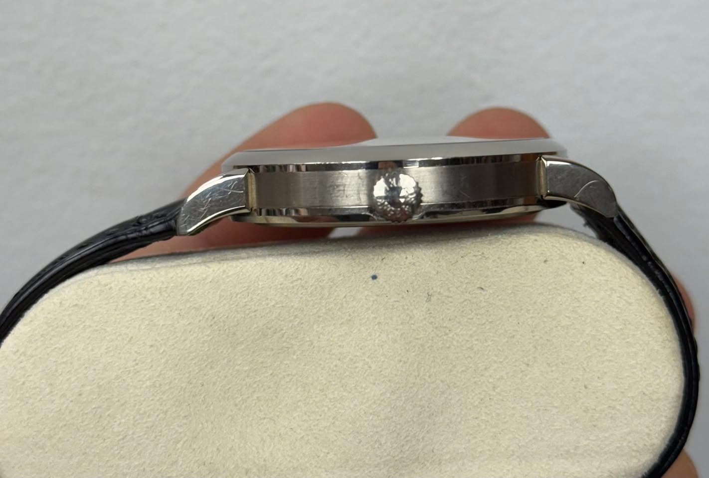 May be an image of wrist watch and jewelry
