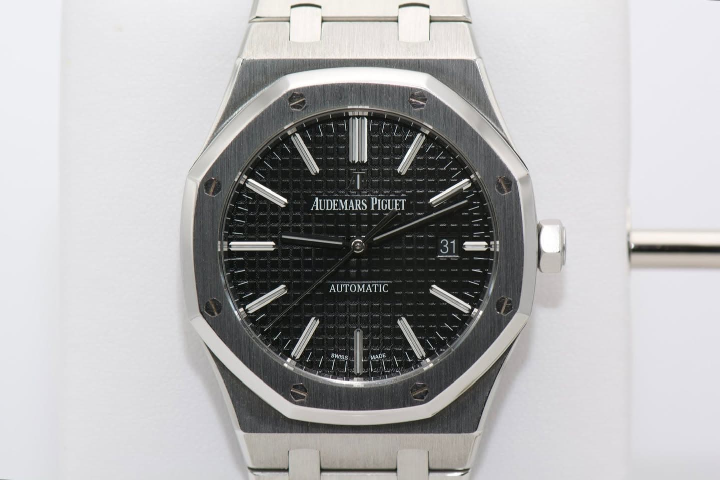 May be an image of wrist watch and text that says 'AUDEMARS PIGUET 31 - SWISS'