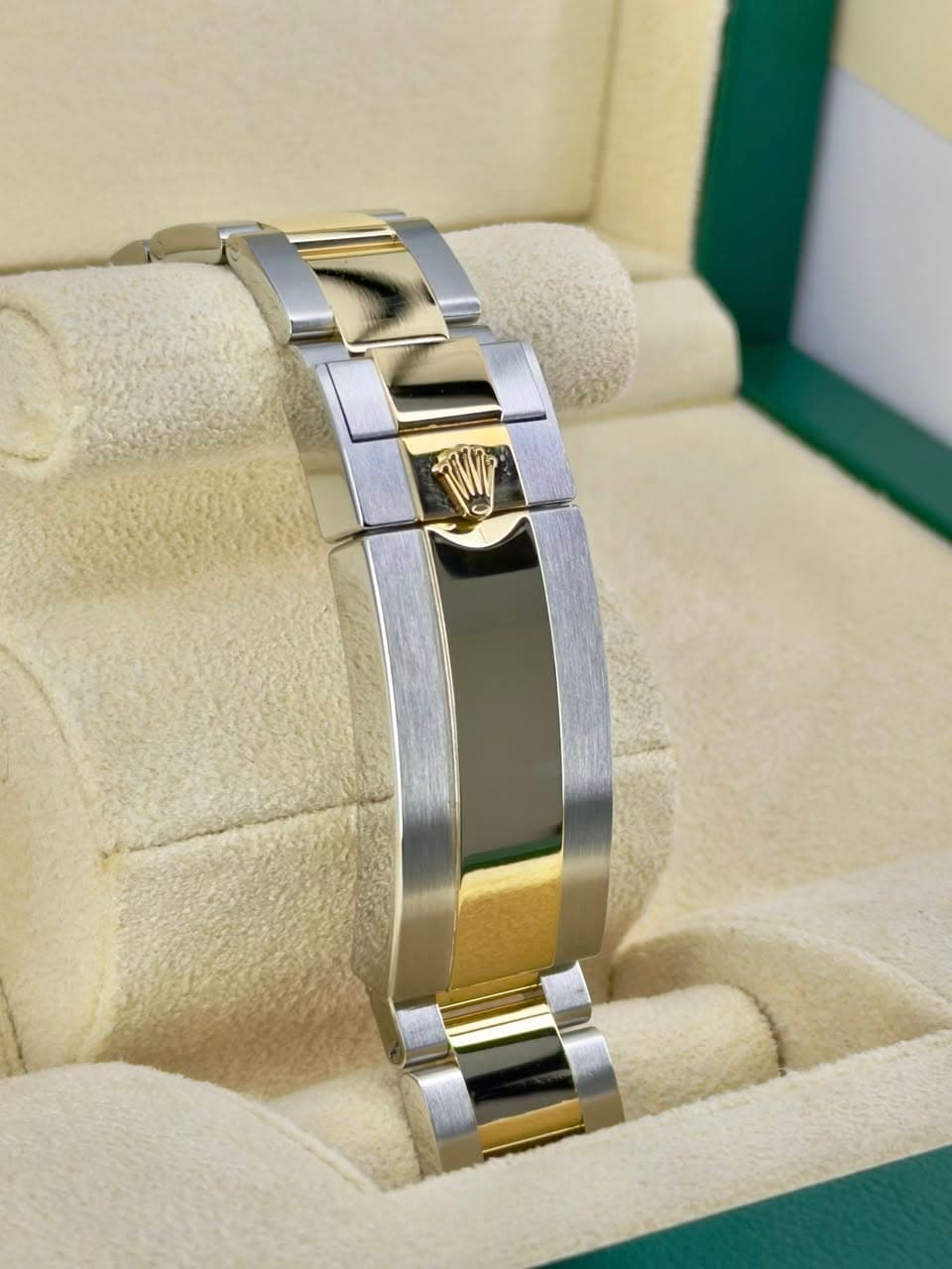 May be an image of wrist watch and jewelry