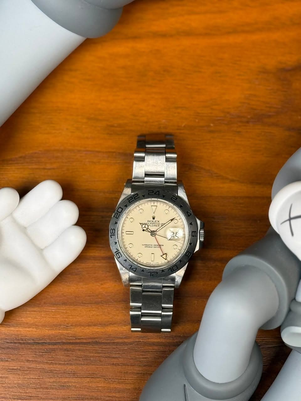 May be an image of wrist watch and text