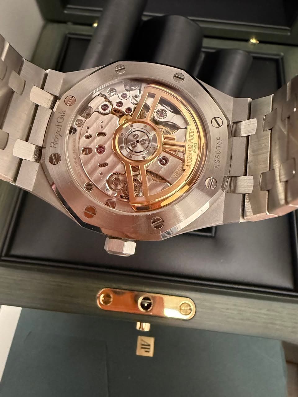 May be an image of wrist watch and text
