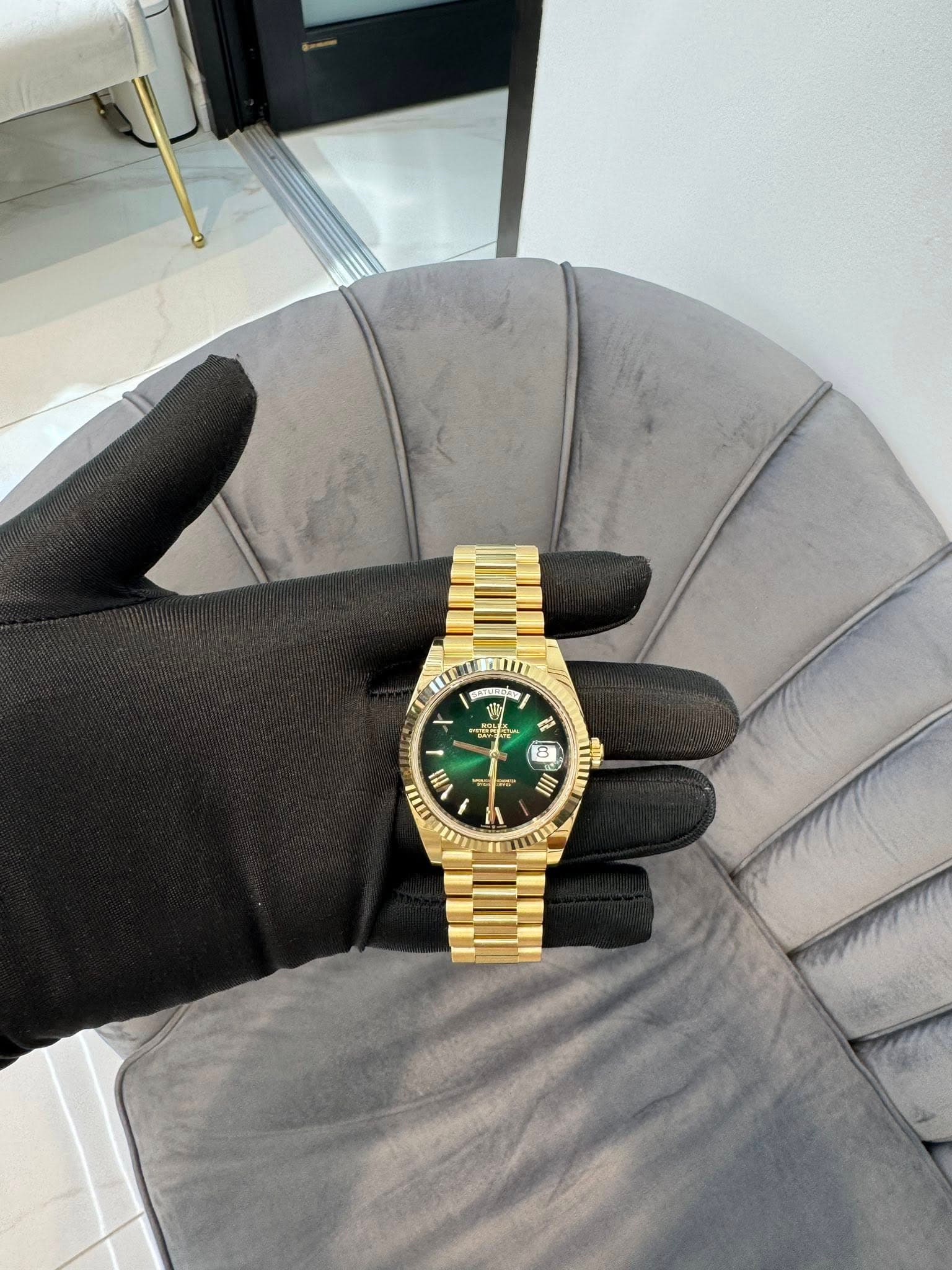 May be an image of wrist watch and text