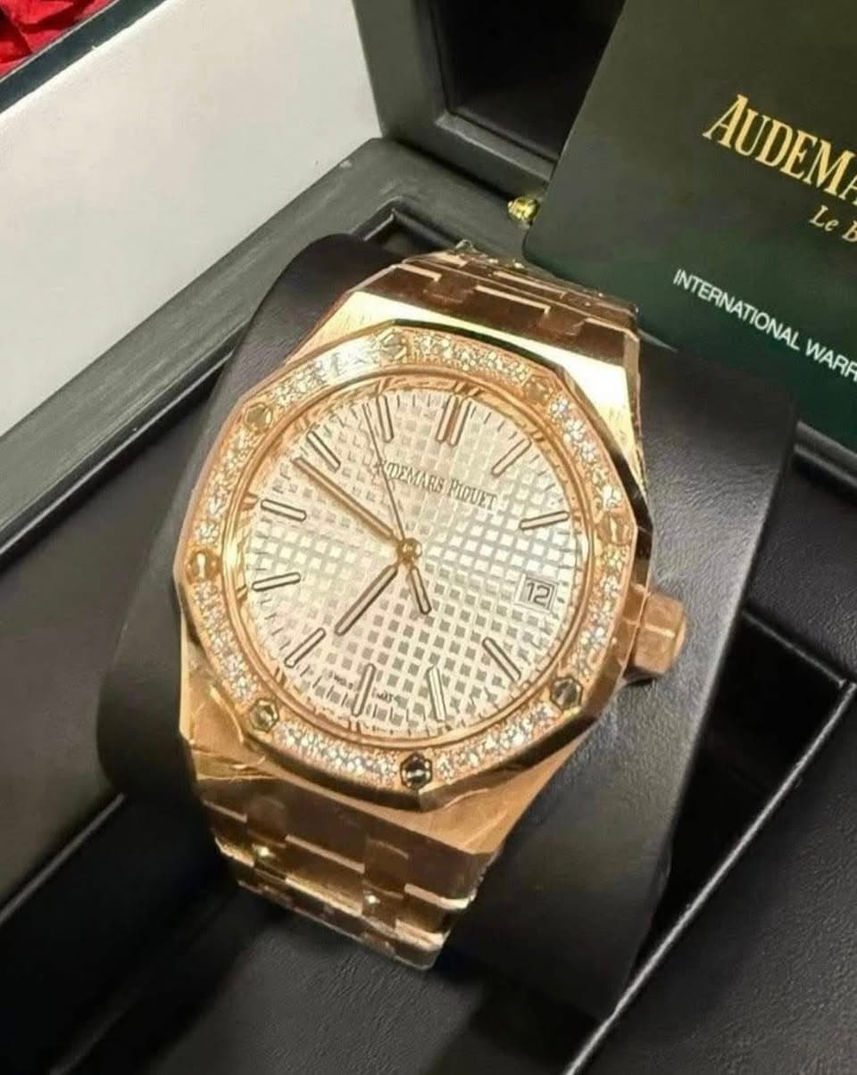 May be an image of wrist watch and text
