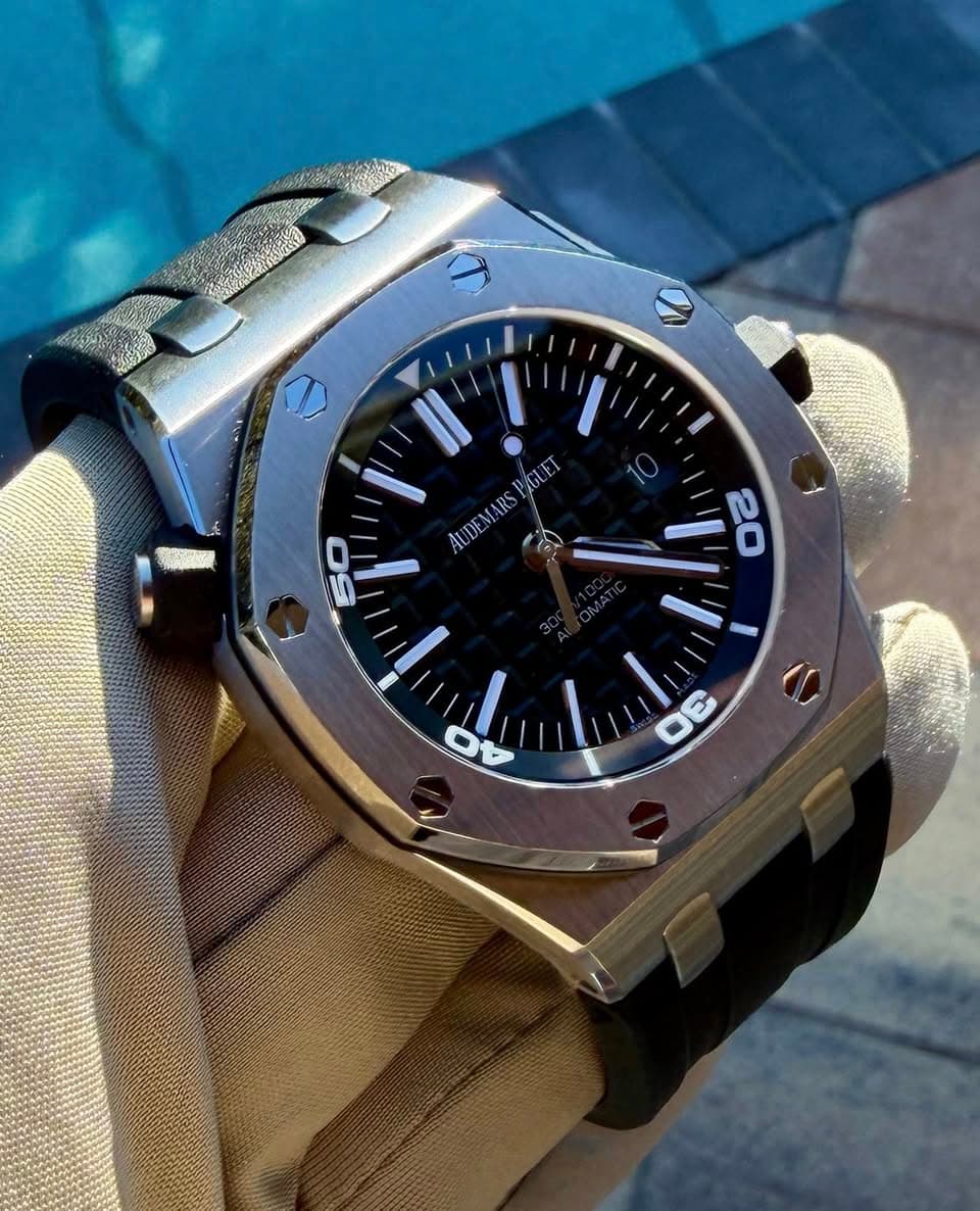 May be an image of wrist watch and text